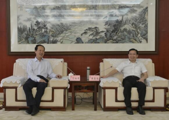 丁焰章拜會南昌市委副書記、市長黃喜忠